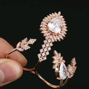 Large white topaz two finger cuff in gold